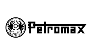 Logo de Petromax avec un design stylisé en noir et blanc et un emblème d'aigle à gauche. Le nom de la marque « Petromax » est écrit en caractères gras et angulaires à droite de l'emblème.