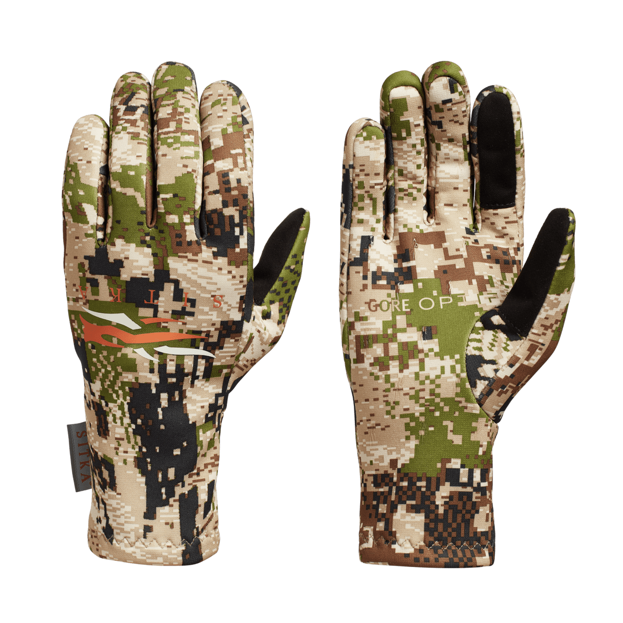 The image depicts a pair of SITKA Traverse Gloves. The gloves have a camouflage pattern. They are made from a polyester fleece fabric that is recycled and stretchy. The gloves have a durable water repellent finish that sheds light precipitation and resists staining. The index finger and thumb have touchscreen compatible Ax Suede, allowing users to operate their smartphones or GPS devices without removing their gloves. The palms of the gloves have a light silicone print that enhances grip. The gloves are designed to be comfortable and versatile, making them suitable for a variety of outdoor activities.