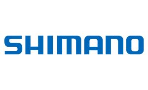 L'image montre le logo Shimano, comportant le nom « Shimano » en lettres majuscules bleues audacieuses avec une police moderne et épurée, sur un fond blanc.