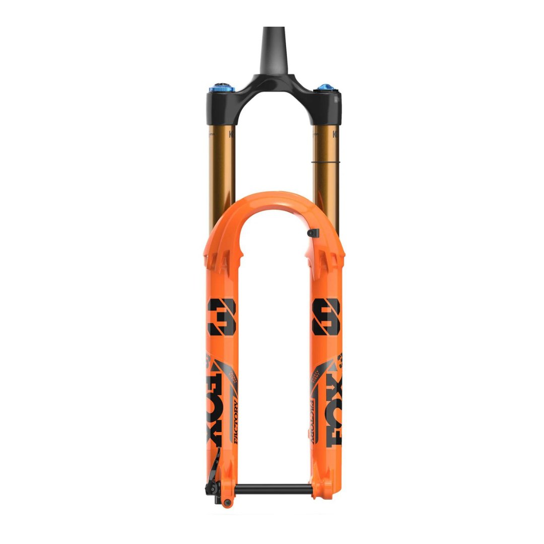 Un FOURCHE FOX 38 FACTORY 170MM 29'' 2022-2023 avec bas de jambes orange, couronne et pivot noirs, et chandeliers dorés. La fourche comporte une marque et des décalcomanies avec le logo « FOX ». Il est conçu pour le vélo tout-terrain, offrant une absorption des chocs pour une conduite plus douce.