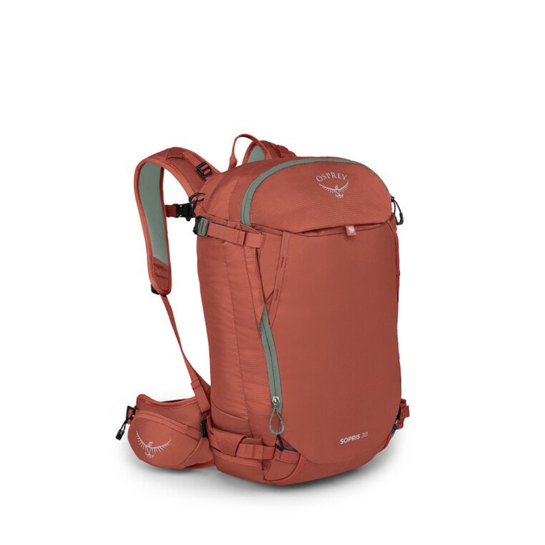 SAC À DOS OSPREY SOPRIS 30 POUR FEMME COULEUR EMBERGLOW ORANGE VU DU SAC ORANGE BRÛLÉ PALE ET GRIS/VERT DE FACE