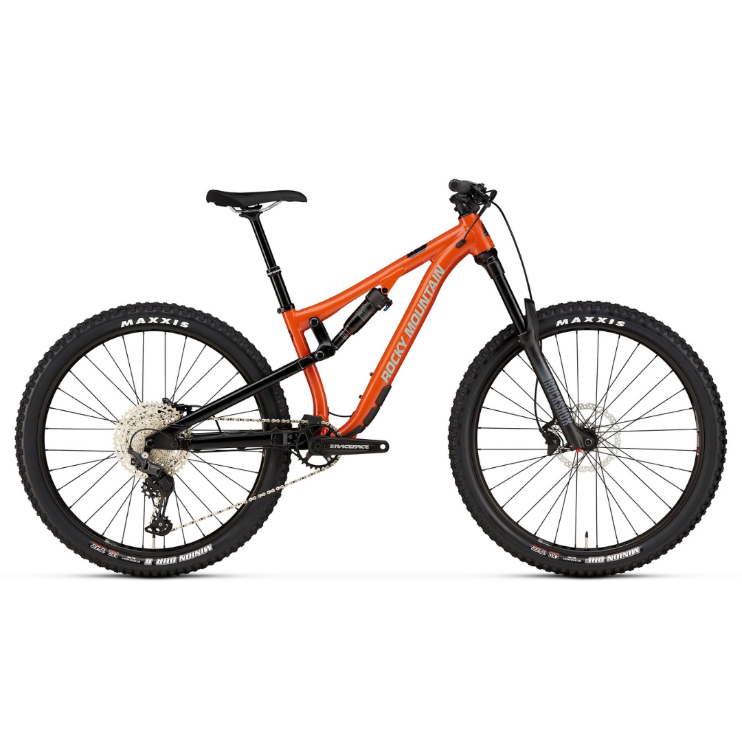 VÉLO DE MONTAGNE ROCKY MOUNTAIN REAPER 27.5 POUR JUNIOR couleur black/orange vu du vélo orange et noir de profil droit